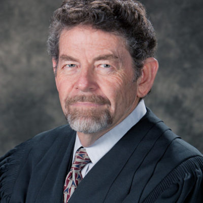 Judge Michael D. Bustamante (Retired) <br/><span style='color:#83603e;font-size:12px;'>New Mexico Court of Appeals</span>
